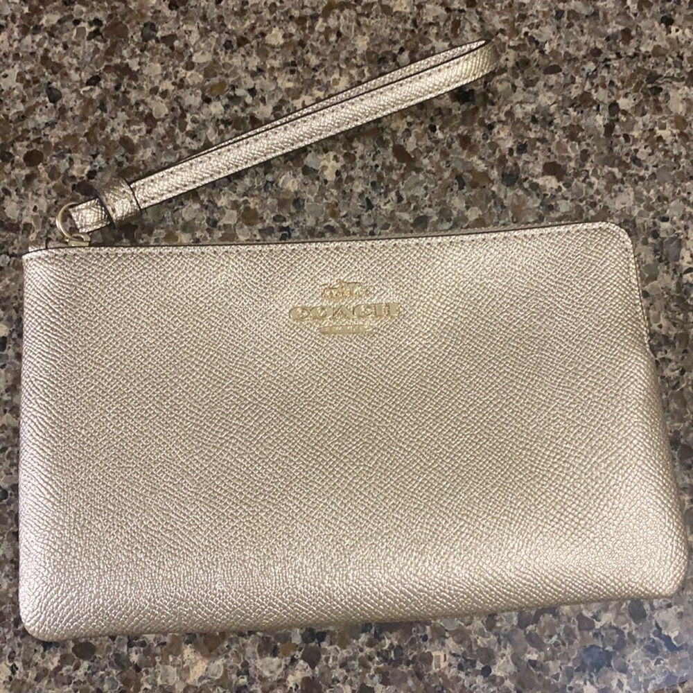 Coach corner zip wristlet.